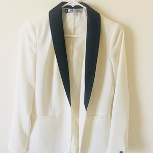 White blazer, black trim. Worn once.